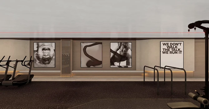 Modern gym interior by Quattro Architecture featuring black exercise equipment, minimalist walls, and motivational art prints in a sleek space.
